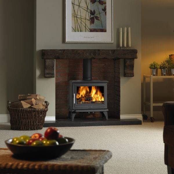 Rowandale 2 widescreen wood burner in brick fireplace